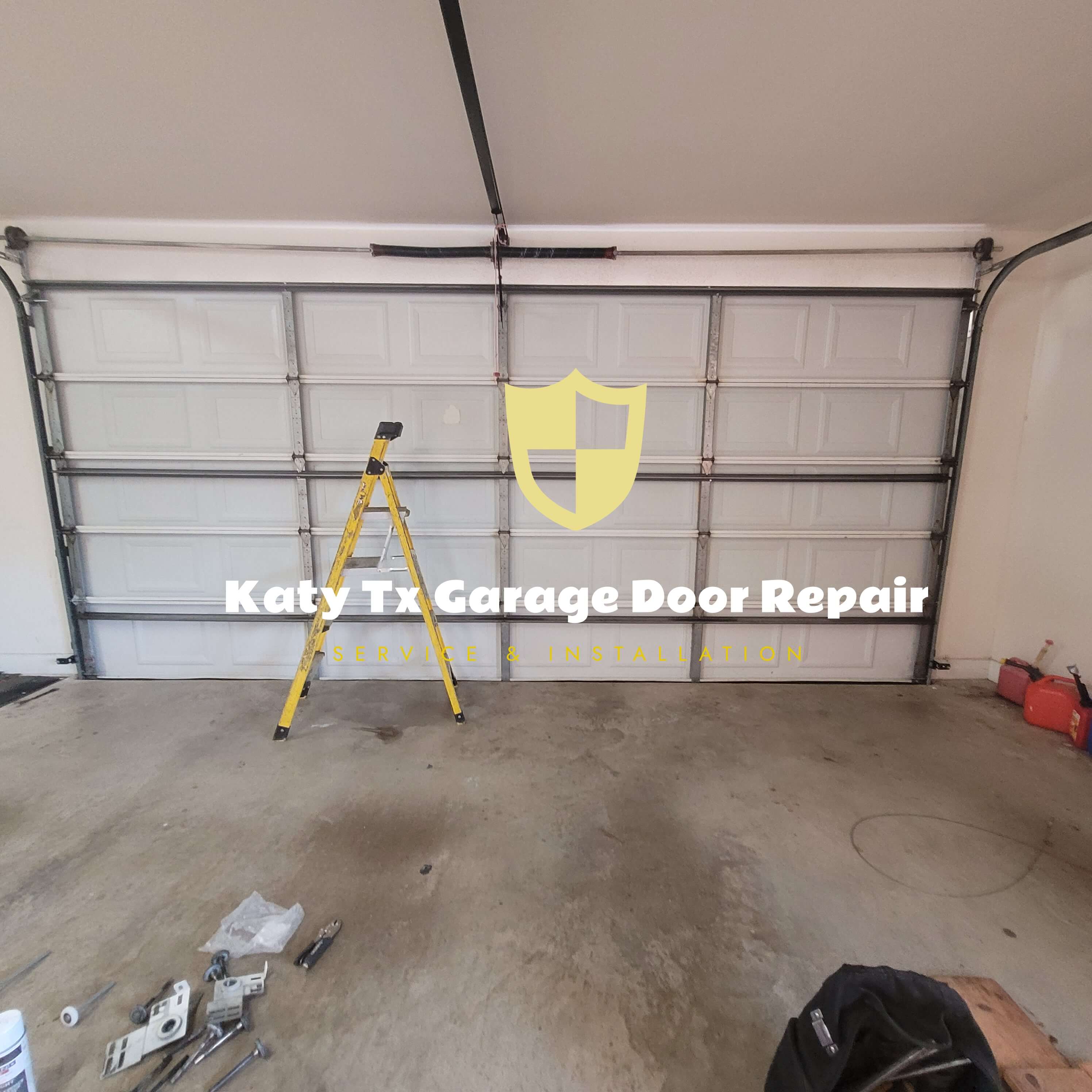 pan-door-garage-door-off-track-repair.jpg